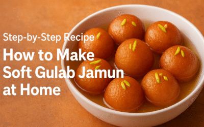 Golden-brown Gulab Jamuns soaked in sugar syrup, garnished with pistachios, served in a white bowl.